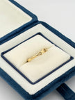 Anillo Infinito circones  Oro amarillo 18k / Talla 8 / 1,20 Gr