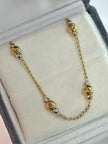 Pulso aro seguido balines diamantados  Tres oros 18k 2,60 Gr / 1,5 mm / 19 Cm Broche 0,15