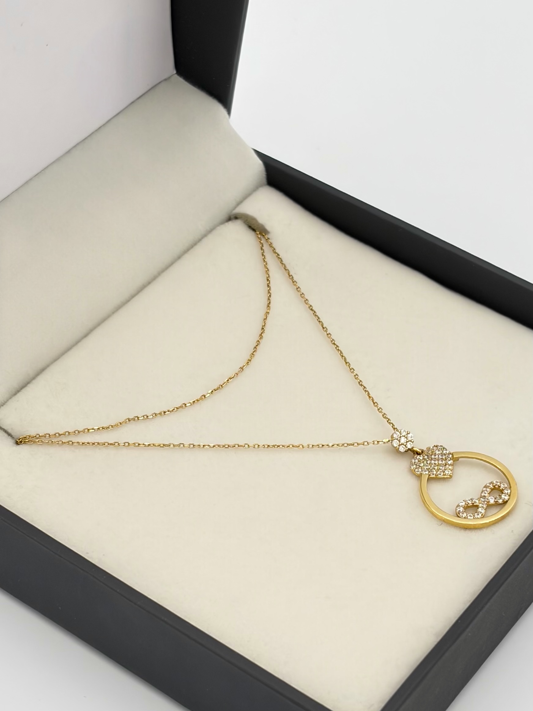 Cadena It aro seguido con dije corazon y infinito casting Oro amarillo 18k 2,96 Gr / 0,88 mm / 45 Cm