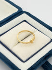 Anillo Inicial T con circones blancos  Oro amarillo 18k / Talla 6/2 / 1,51 Gr