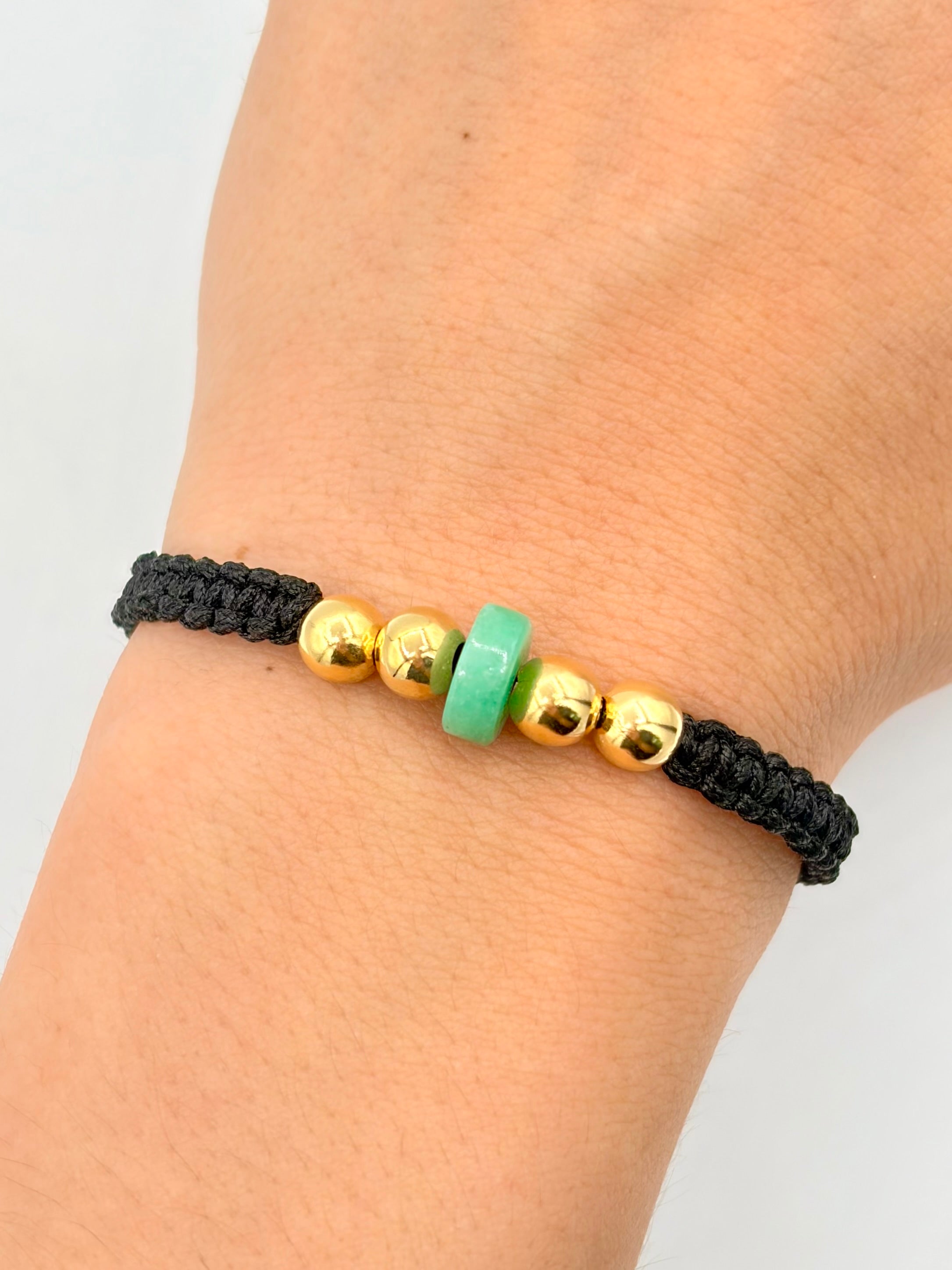 Pulsera tejida 4BL #6 dona murralla en medio hilo negro Oro amarillo 18k 0,71 Gr