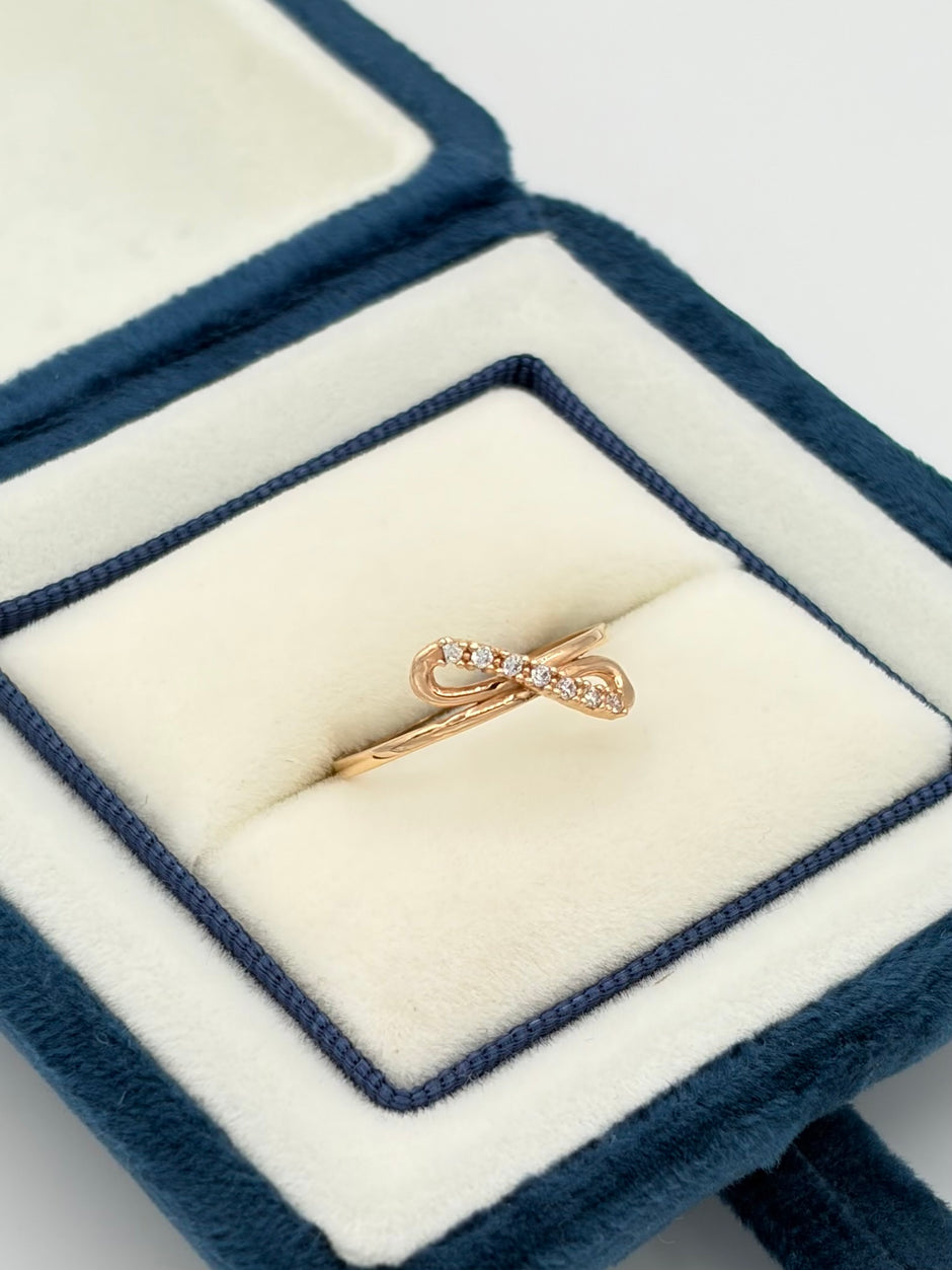 Anillo Infinito circones  Oro rosa 18k / Talla 6 / 1,28 Gr