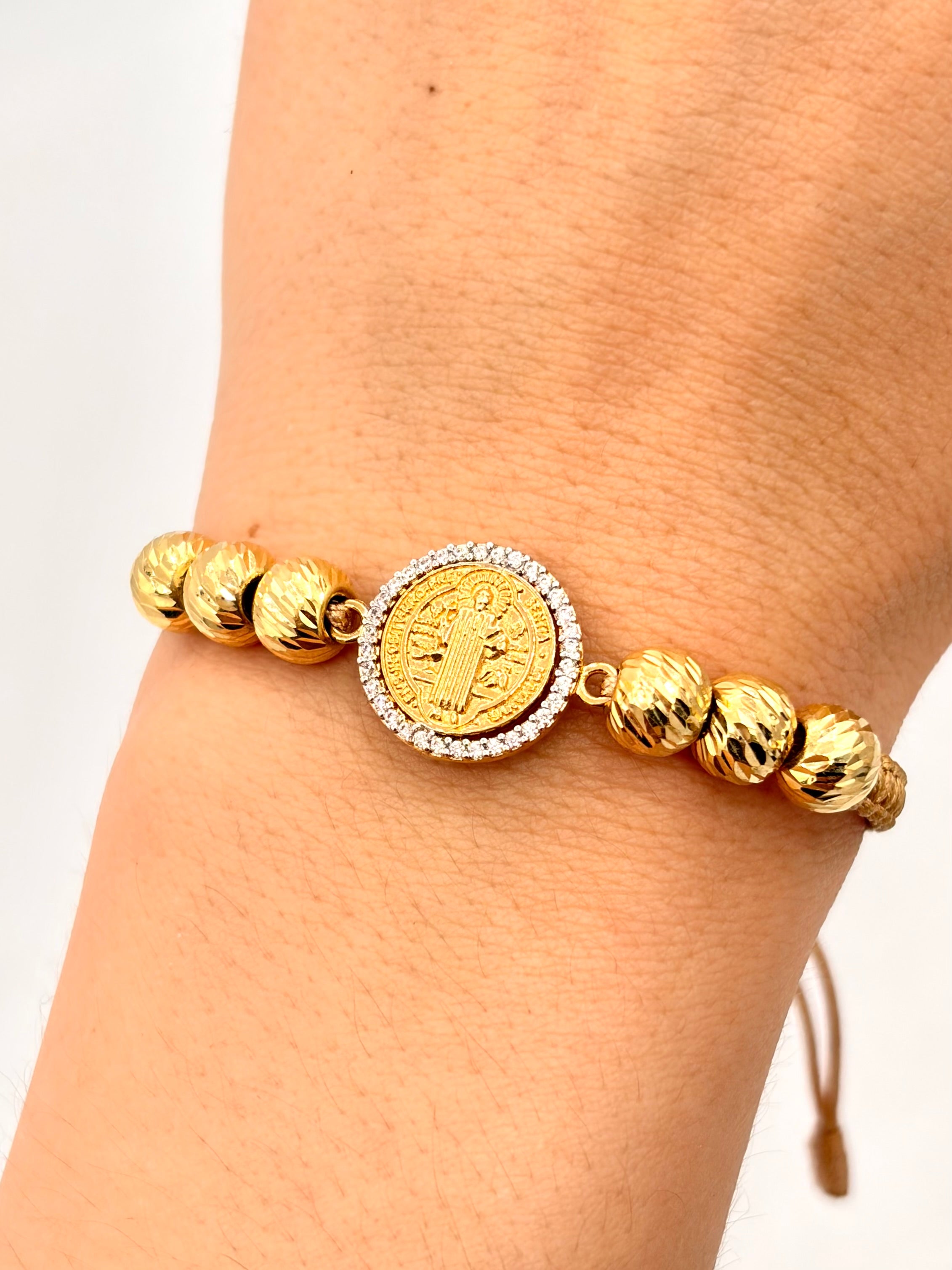 Pulsera tejida herraje san benito circones 6BD #7 hilo beige Oro amarillo 18k 3,57 Gr