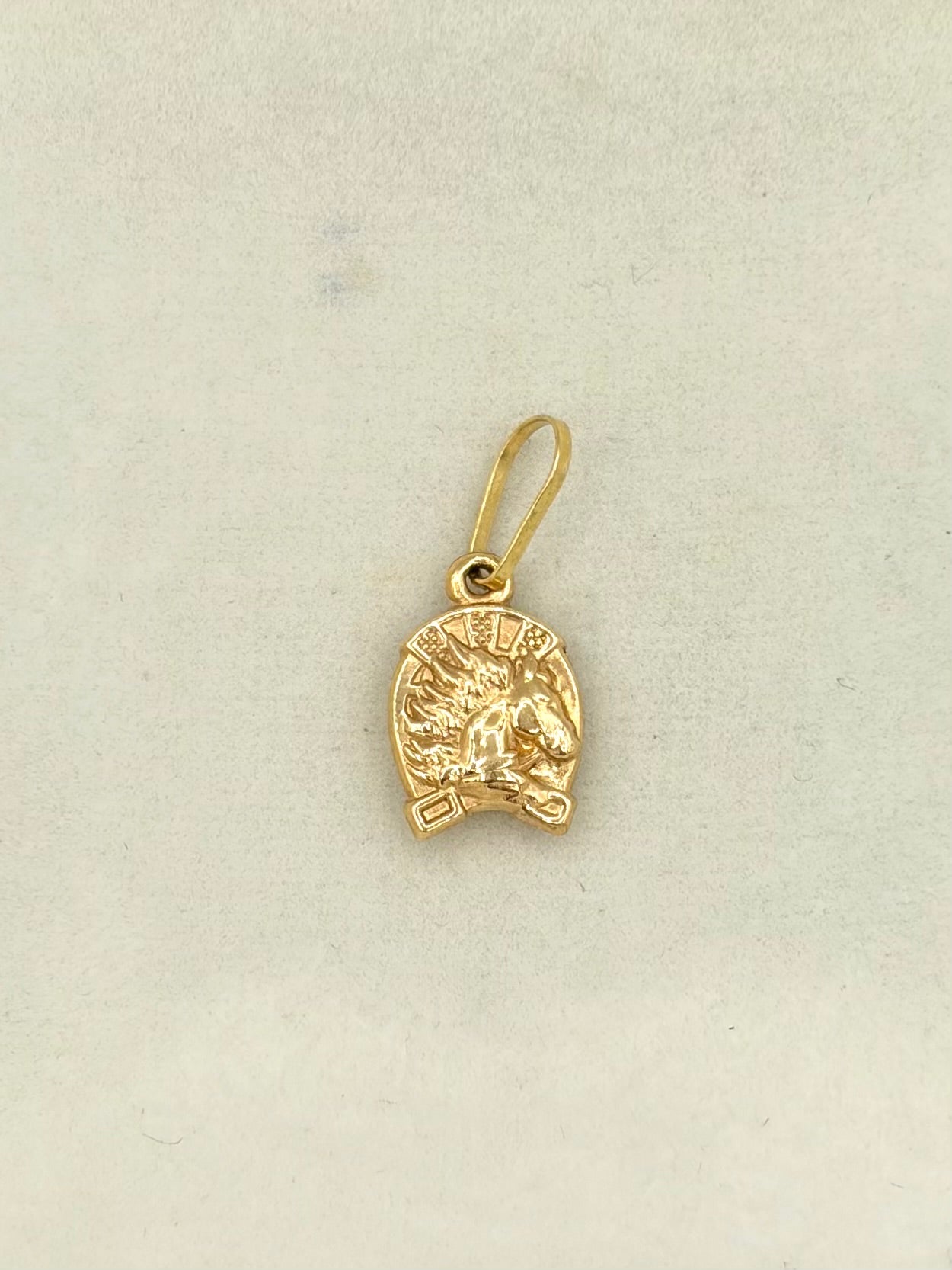 Dije herradura de caballo Oro amarillo 18k 0,54 Gr / 6,8 mm / 2,0 Cm