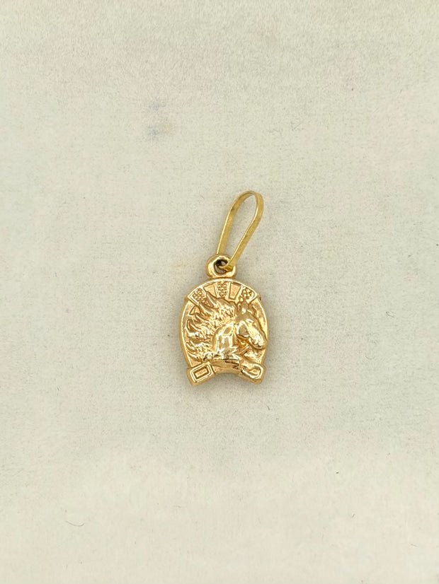 Dije herradura de caballo Oro amarillo 18k 0,54 Gr / 6,8 mm / 2,0 Cm
