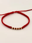 Pulsera tejida 5BD #3 balines de neopreno rojos hilo rojo Oro amarillo 18k 0,20 Gr