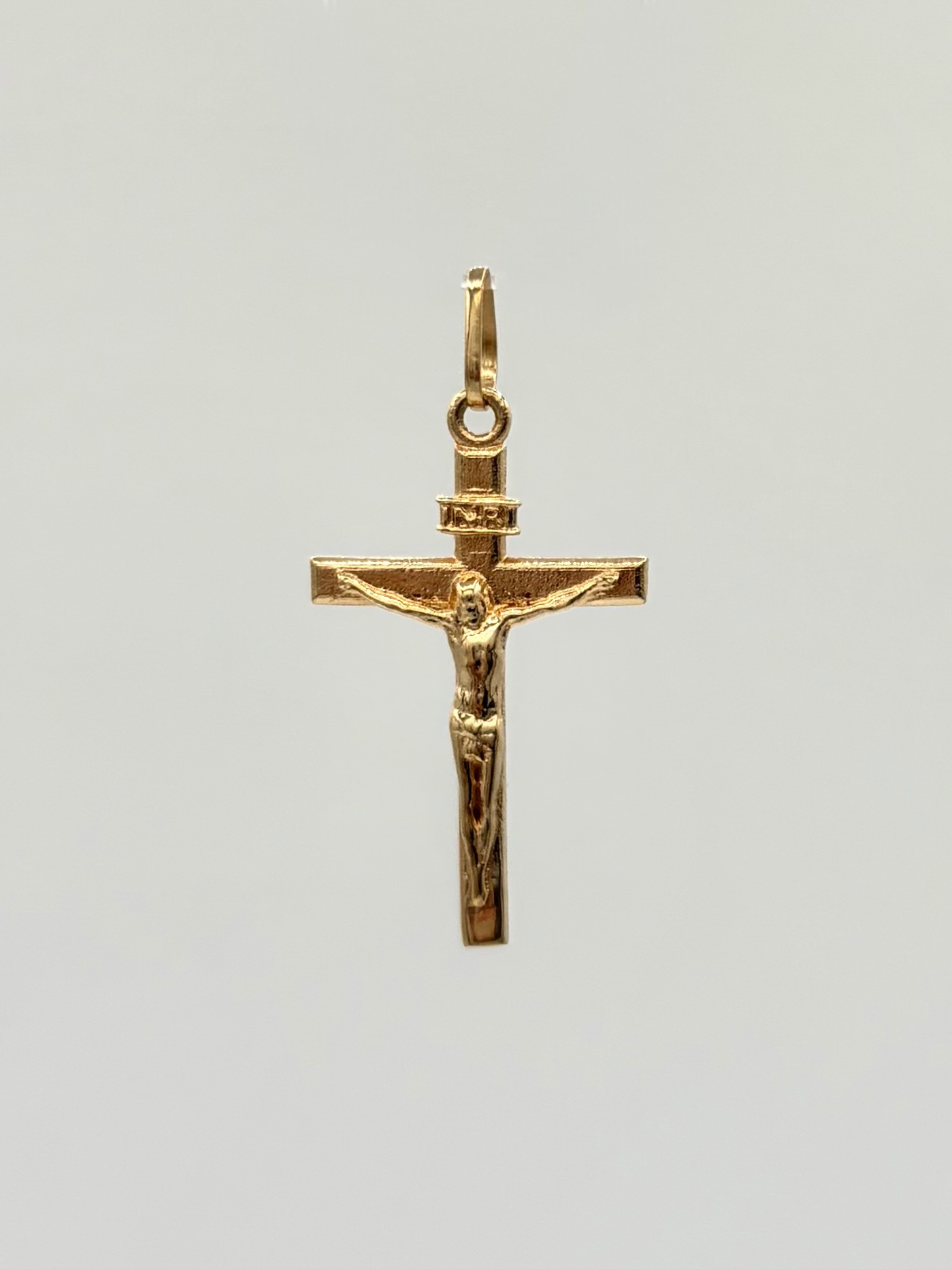 Dije Cruz cristo  Oro amarillo 18k 0,78 Gr / 1,2 Cm
