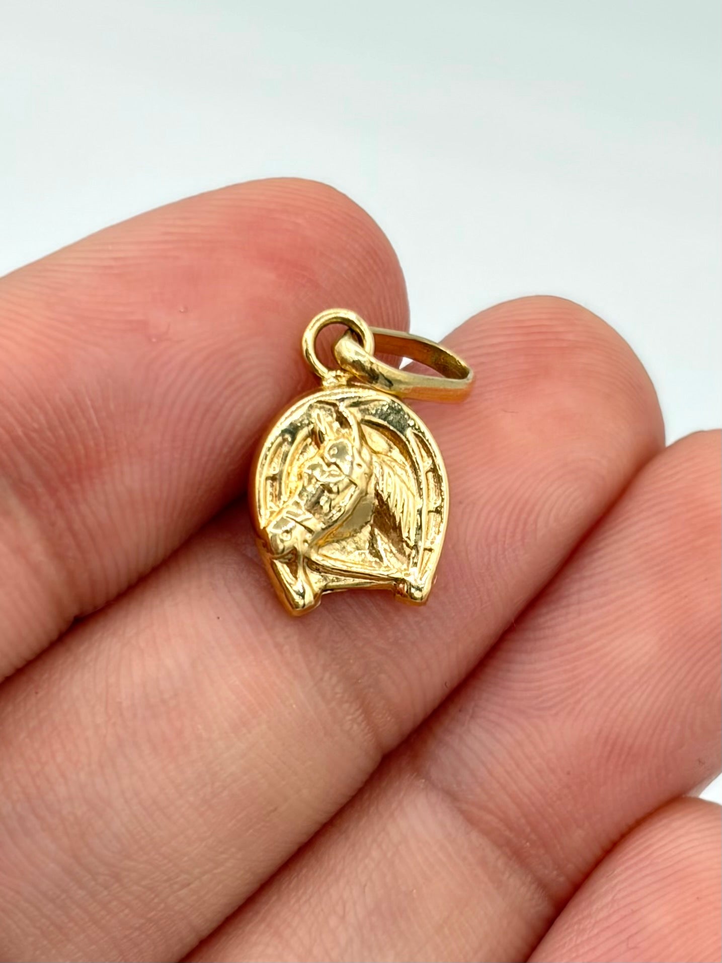 Dije Herradura de caballo Oro amarillo 18k 0,63 Gr / 9 mm