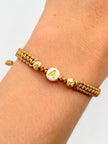Pulsera tejida letra A 2BD #5 hilo beige Oro amarillo 18k 0,15 Gr