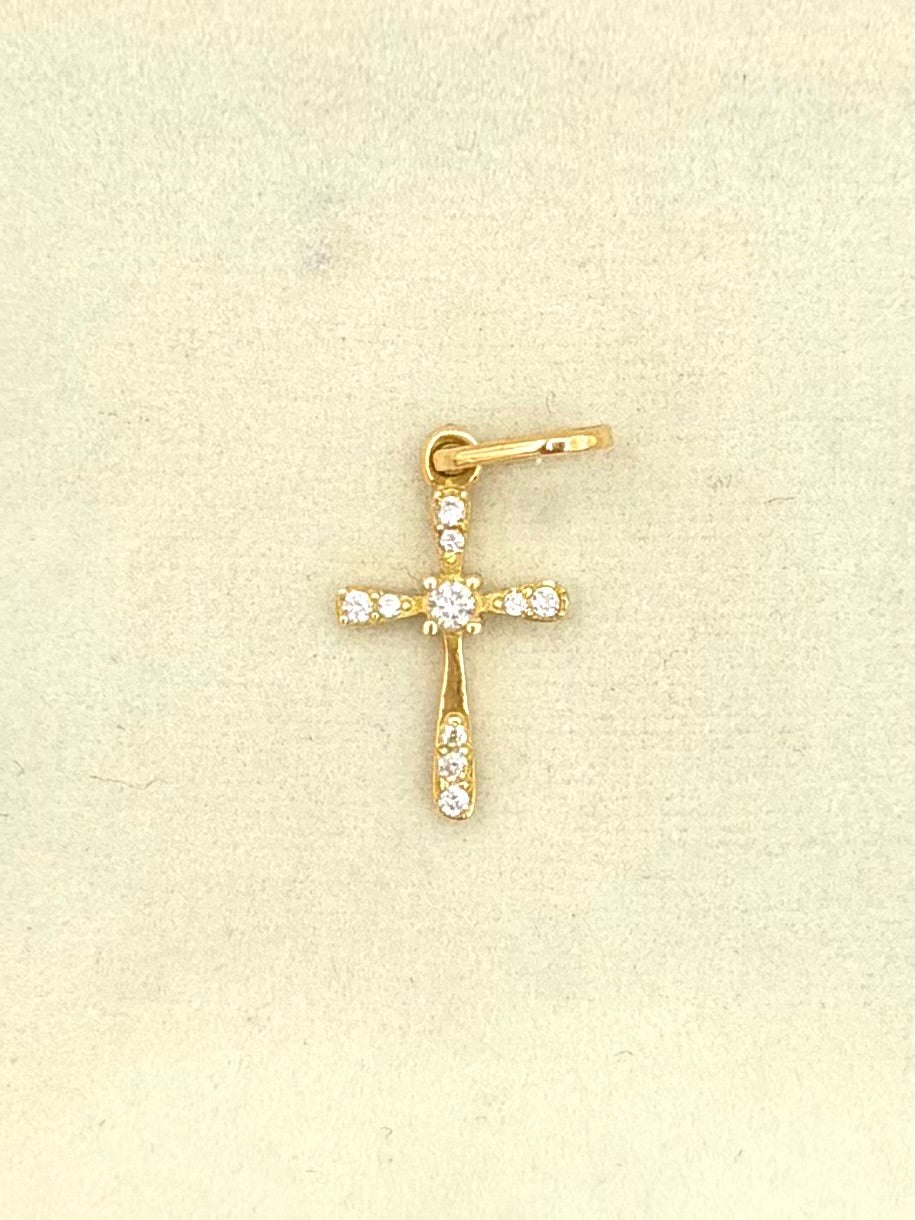 Dije cruz con circones blancos en el centro Oro amarillo 18k 0,65 Gr / 2,5 Cm
