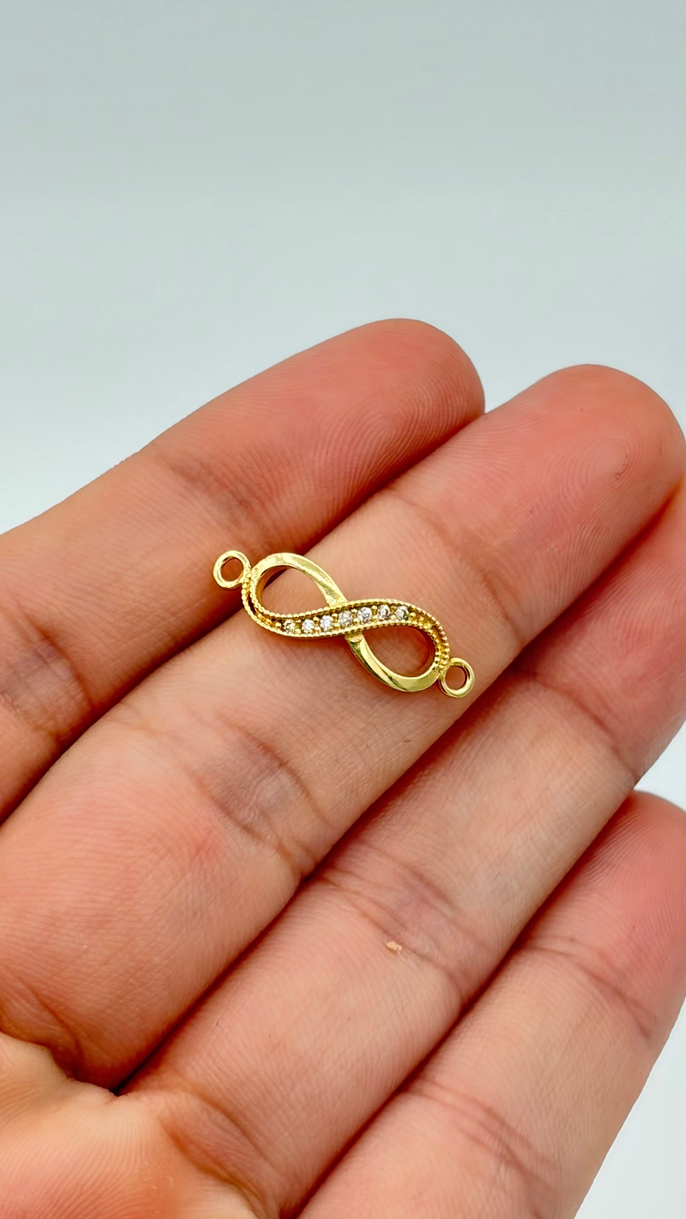Herraje infinito circones blancos  Oro amarillo 18k 0,69 Gr / 2 Cm