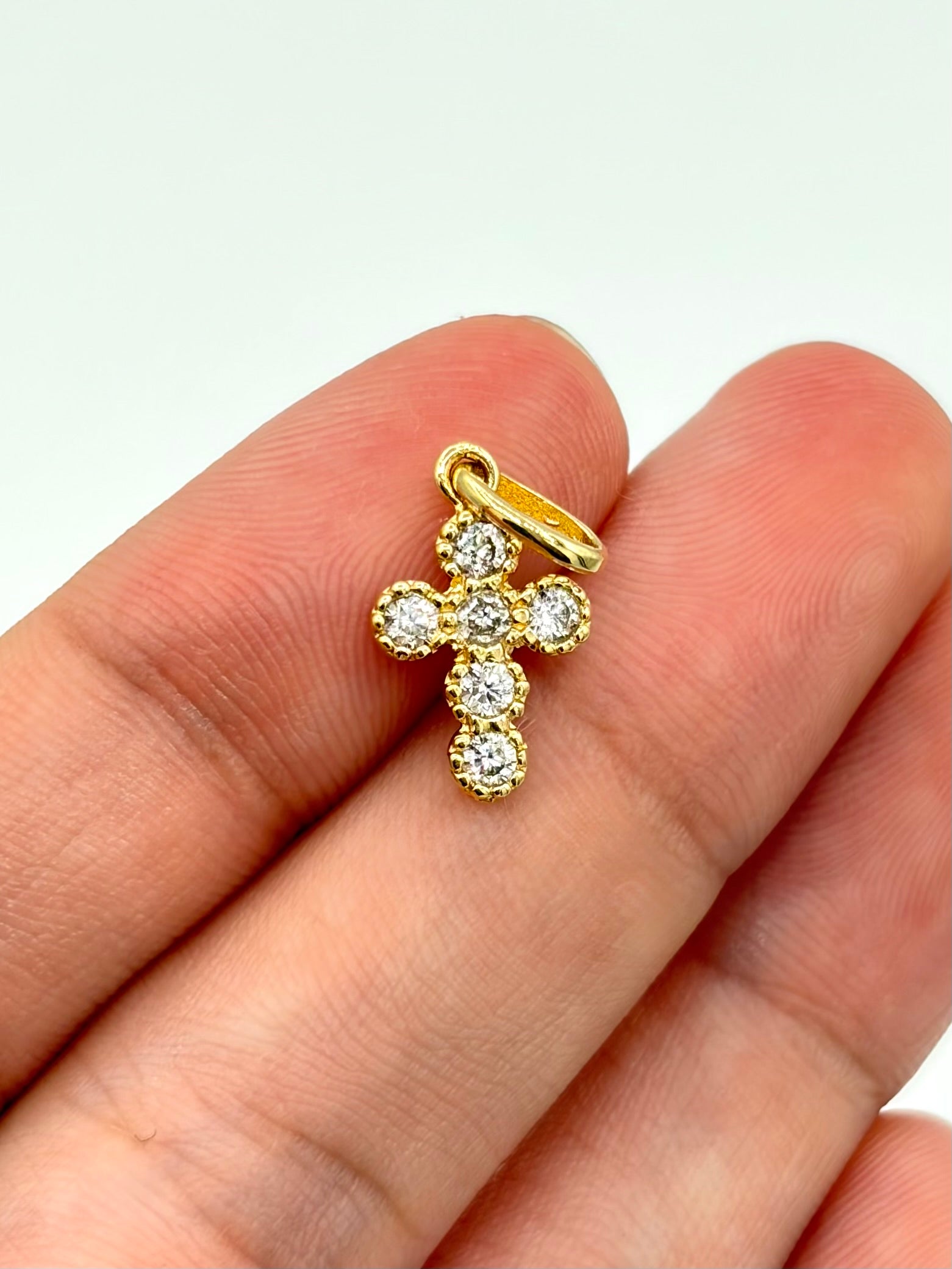 Dije cruz circones blancos Oro amarillo 18k 1,07 Gr / 2,0 Cm