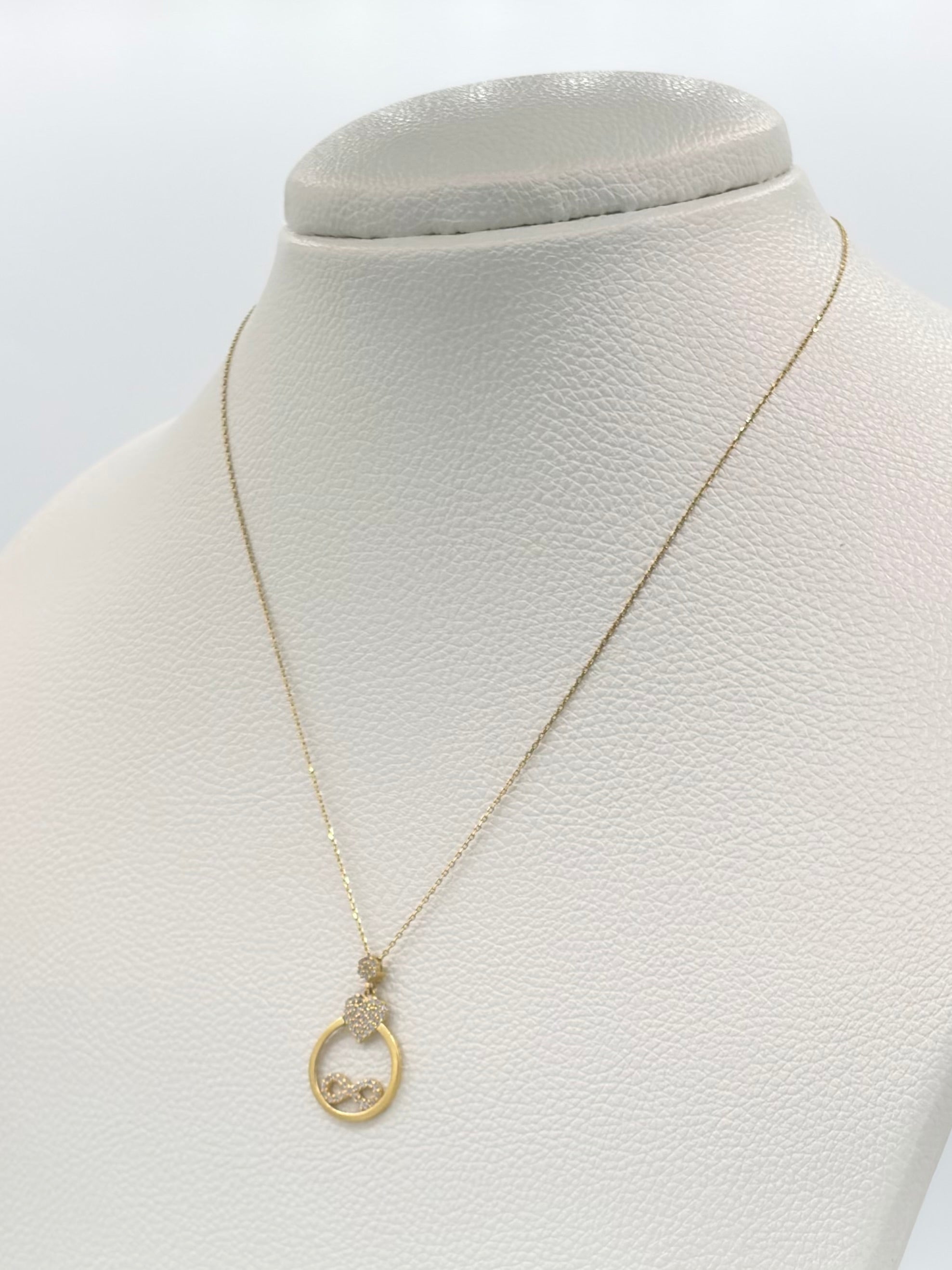Cadena It aro seguido con dije corazon y infinito casting Oro amarillo 18k 2,96 Gr / 0,88 mm / 45 Cm