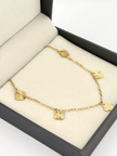 Tobillera aro seguido con dijes trebol diamantado Oro amarillo 18k 2,50 Gr / 2,0 mm / 25 Cm Broche 0,15