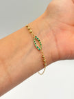 Pulso ovalo circones verdes con balines #3 Oro amarillo 18k 2,08 Gr / 1 mm / 19,1 Cm Broche 0,15