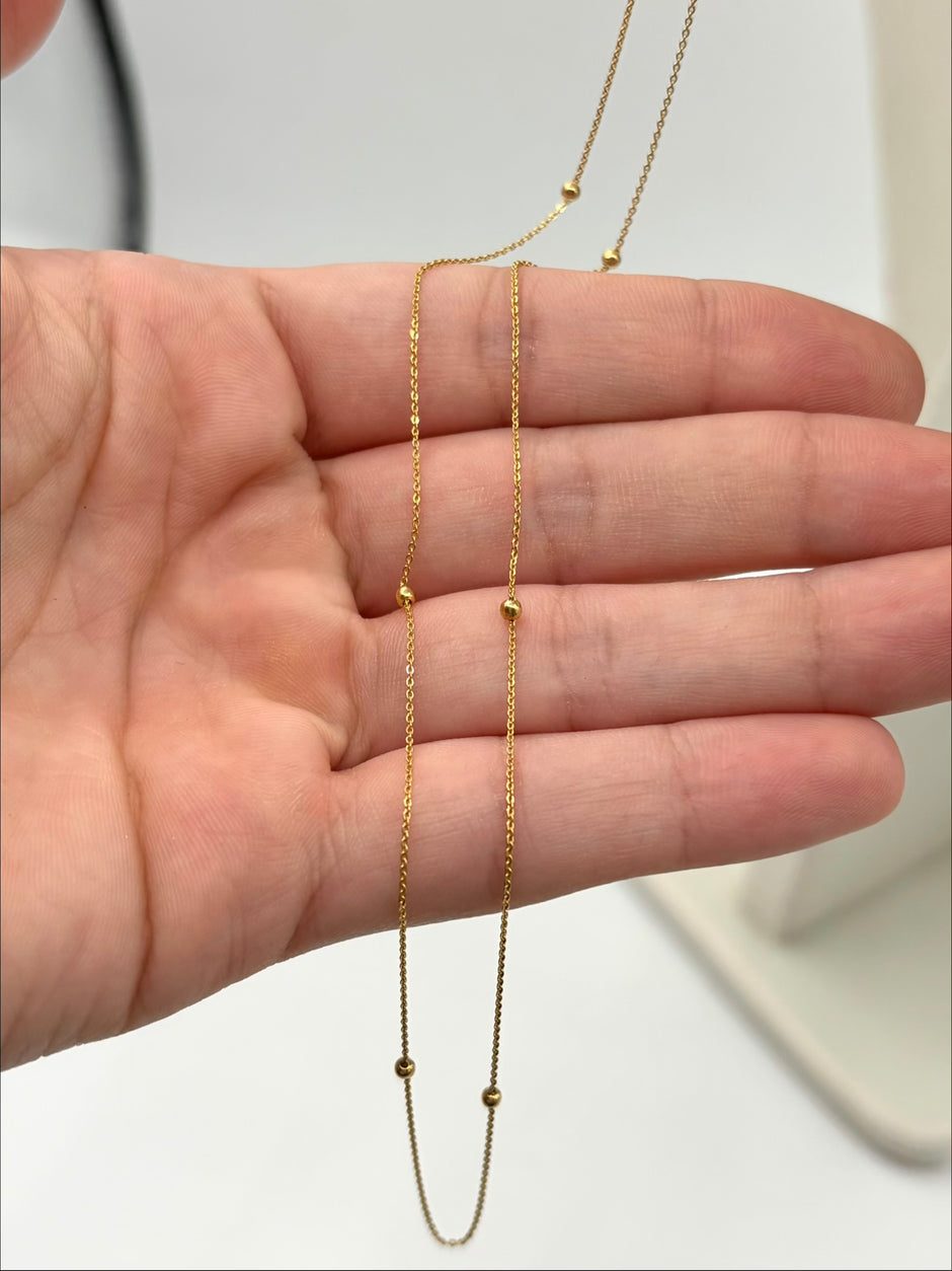 Cadena It aro seguido con balines lisos Oro amarillo 18k +1 / 1,30 Gr / 1,6 mm / 50 Cm