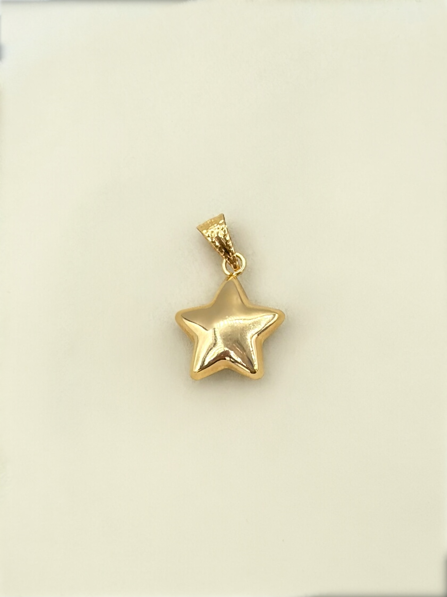 Dije Estrella   Oro amarillo 18k 0,62 Gr / 1 Cm