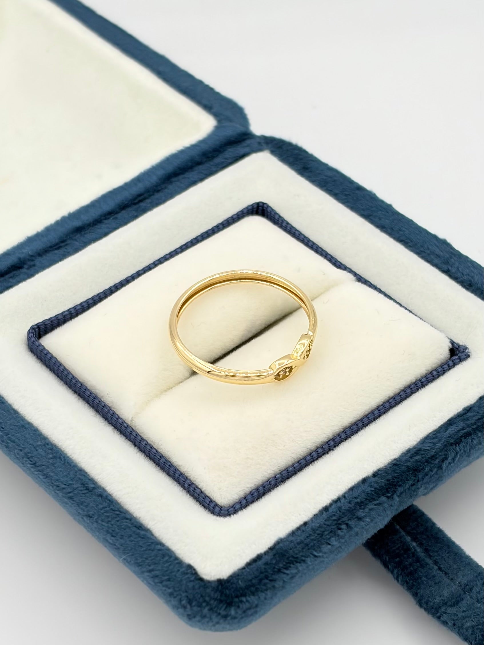 Anillo Infinito circones  Oro amarillo 18k / Talla 8 / 1,20 Gr