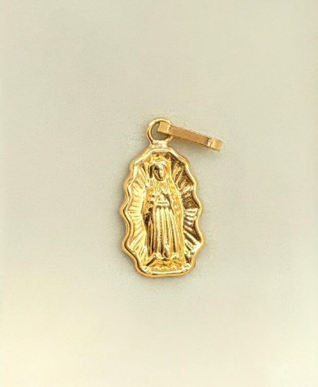 Dije silueta virgen de Guadalupe  Oro amarillo 18k 0,60 Gr / 2,9 Cm