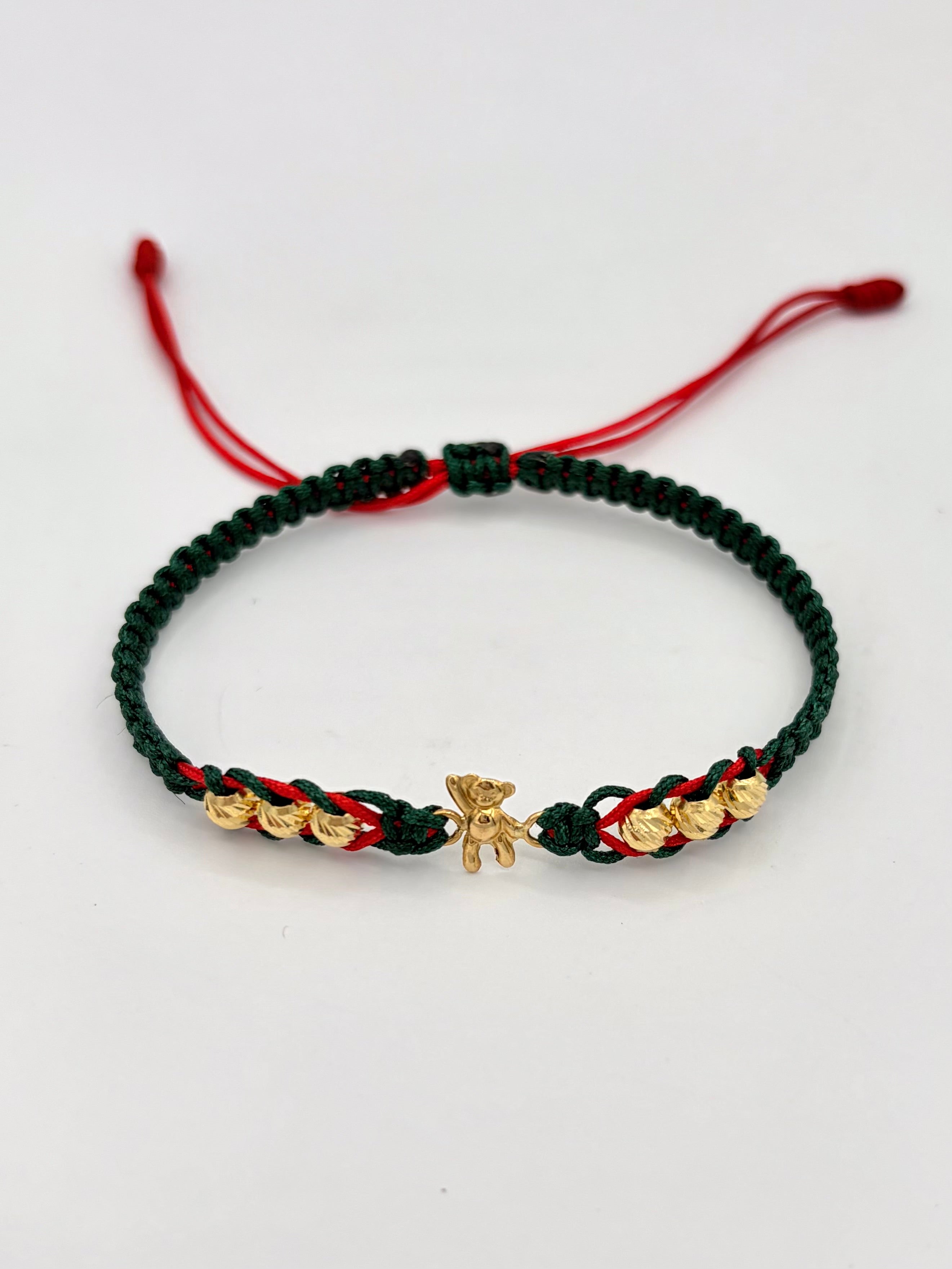 Pulsera tejida herraje osito 6BD # 4 hilo verde y rojo Oro amarillo 18k 0,45 Gr