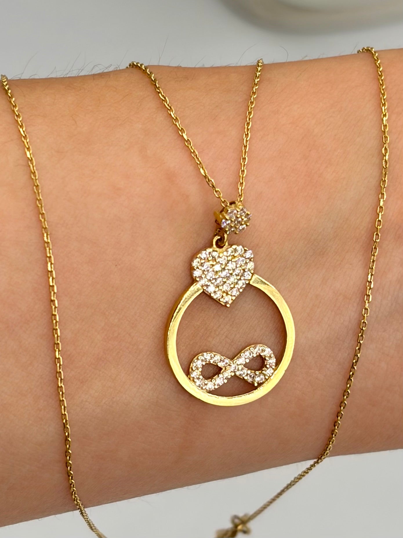 Cadena It aro seguido con dije corazon y infinito casting Oro amarillo 18k 2,96 Gr / 0,88 mm / 45 Cm