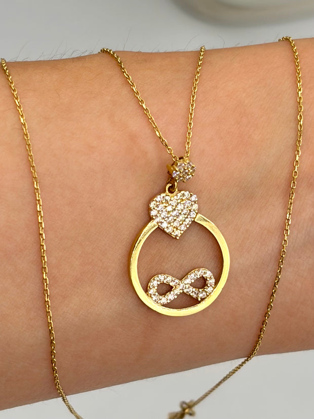 Cadena It aro seguido con dije corazon y infinito casting Oro amarillo 18k 2,96 Gr / 0,88 mm / 45 Cm