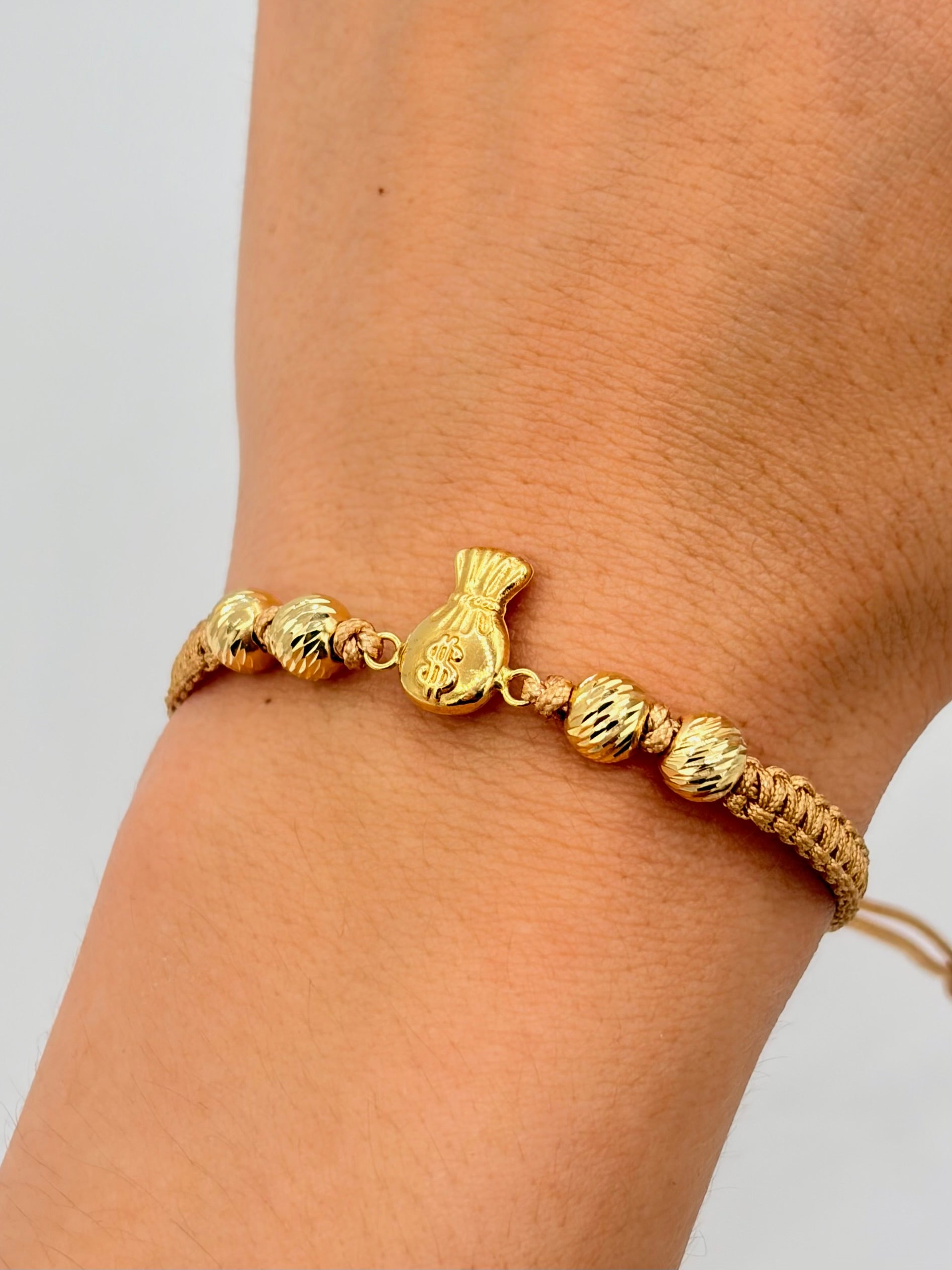 Pulsera tejida herraje bolsa dinero 4BD #6 hilo beige Oro amarillo 18k 1,01 Gr