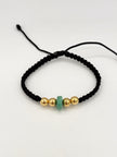 Pulsera tejida 4BL #6 dona murralla en medio hilo negro Oro amarillo 18k 0,71 Gr