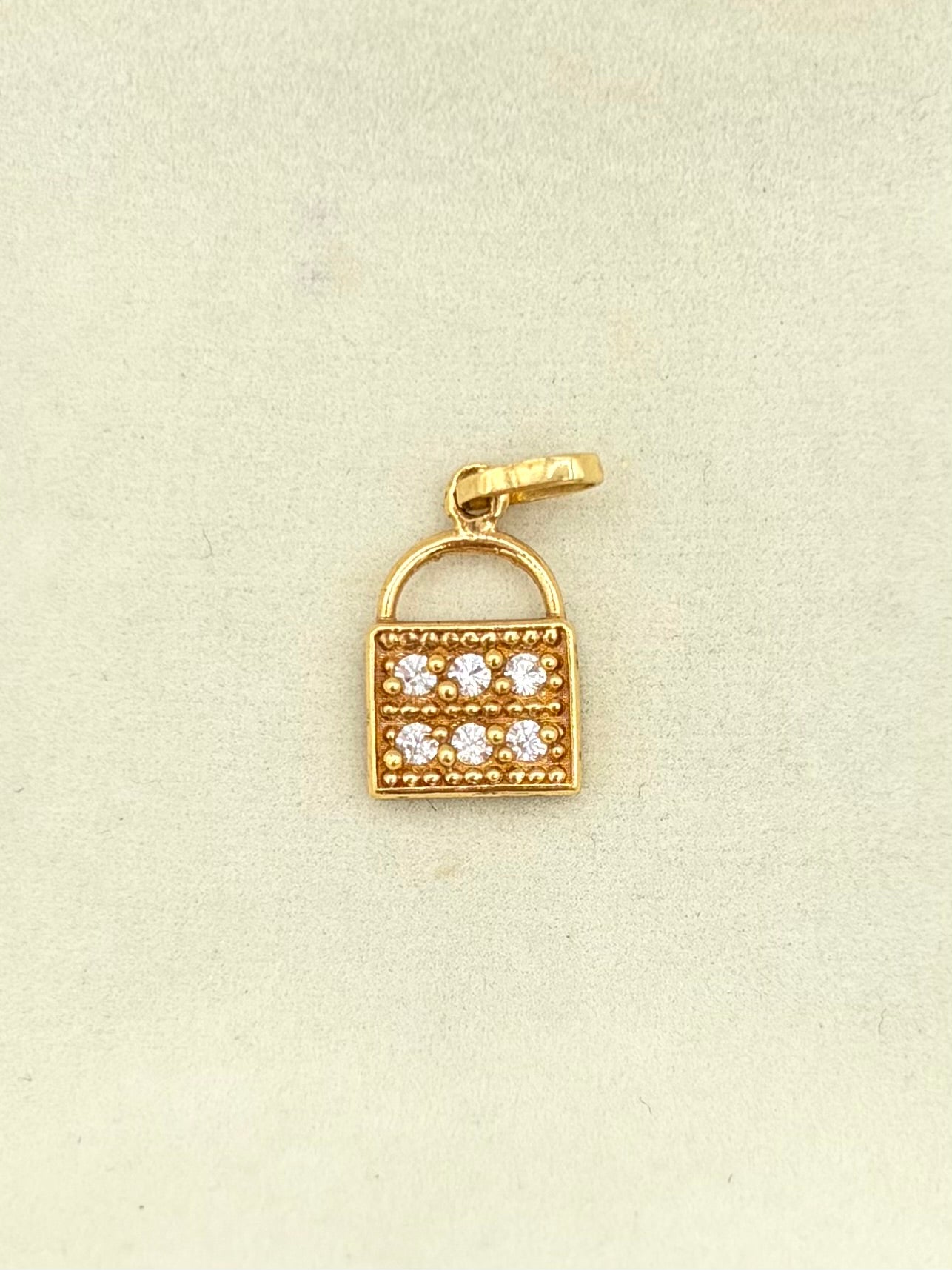 Dije Candado Oro amarillo 18k 1,42 Gr / 1 Cm