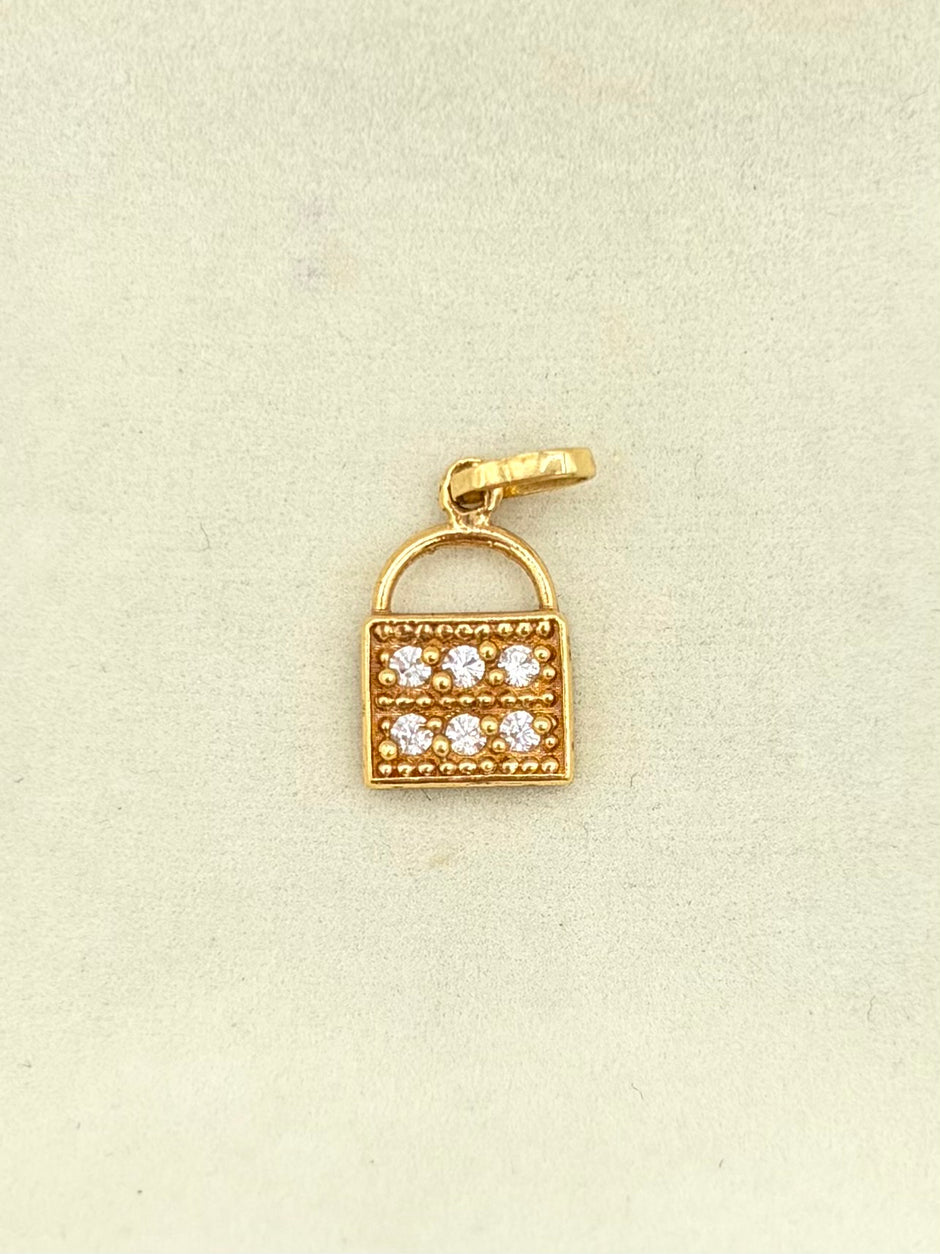 Dije Candado Oro amarillo 18k 1,42 Gr / 1 Cm