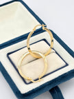 Candonga Ovalada plana lisa  Oro amarillo 18k 2,08 Gr / 2,8 Cm