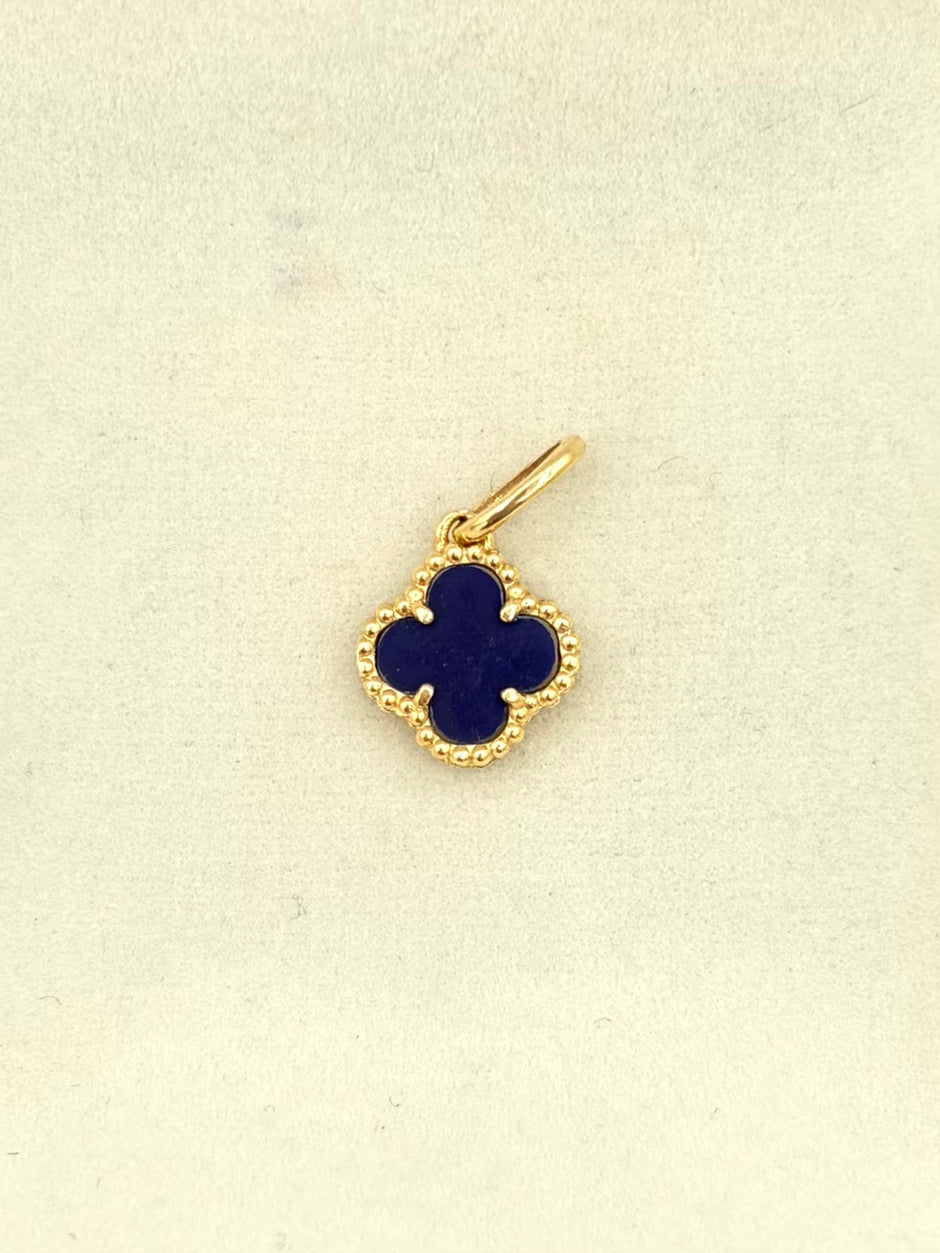 Dije Trebol morado Oro amarillo 18k 1,24 Gr / 1 Cm