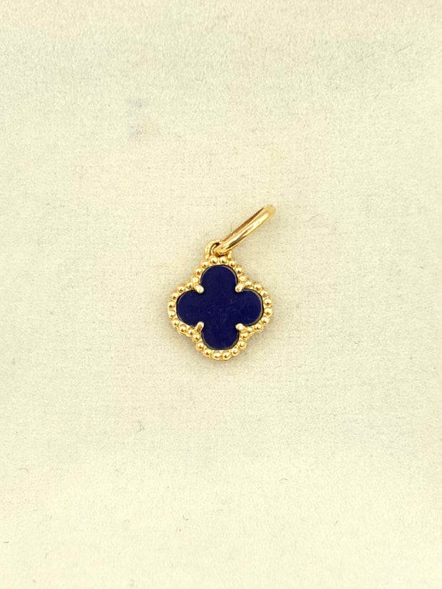Dije Trebol morado Oro amarillo 18k 1,24 Gr / 1 Cm