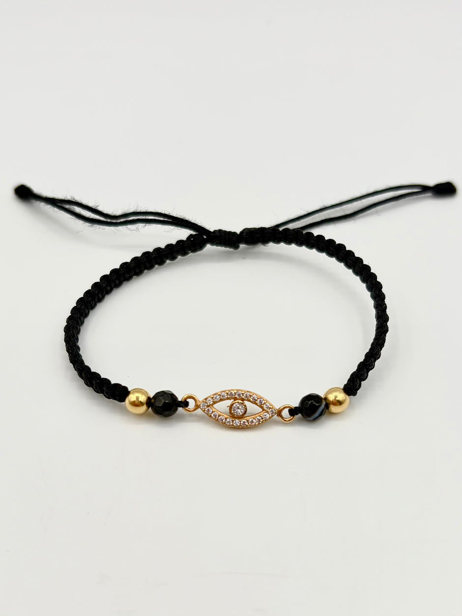 Pulsera tejida herraje ojo circones blancos 2BL #4 hilo negro Oro amarillo 18k 0,80 Gr