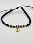 Pulsera tejida dije corona 6BD #3 piedras azules hilo azul Oro amarillo 18k 0,45 Gr