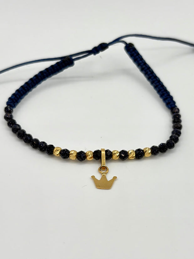 Pulsera tejida dije corona 6BD #3 piedras azules hilo azul Oro amarillo 18k 0,45 Gr