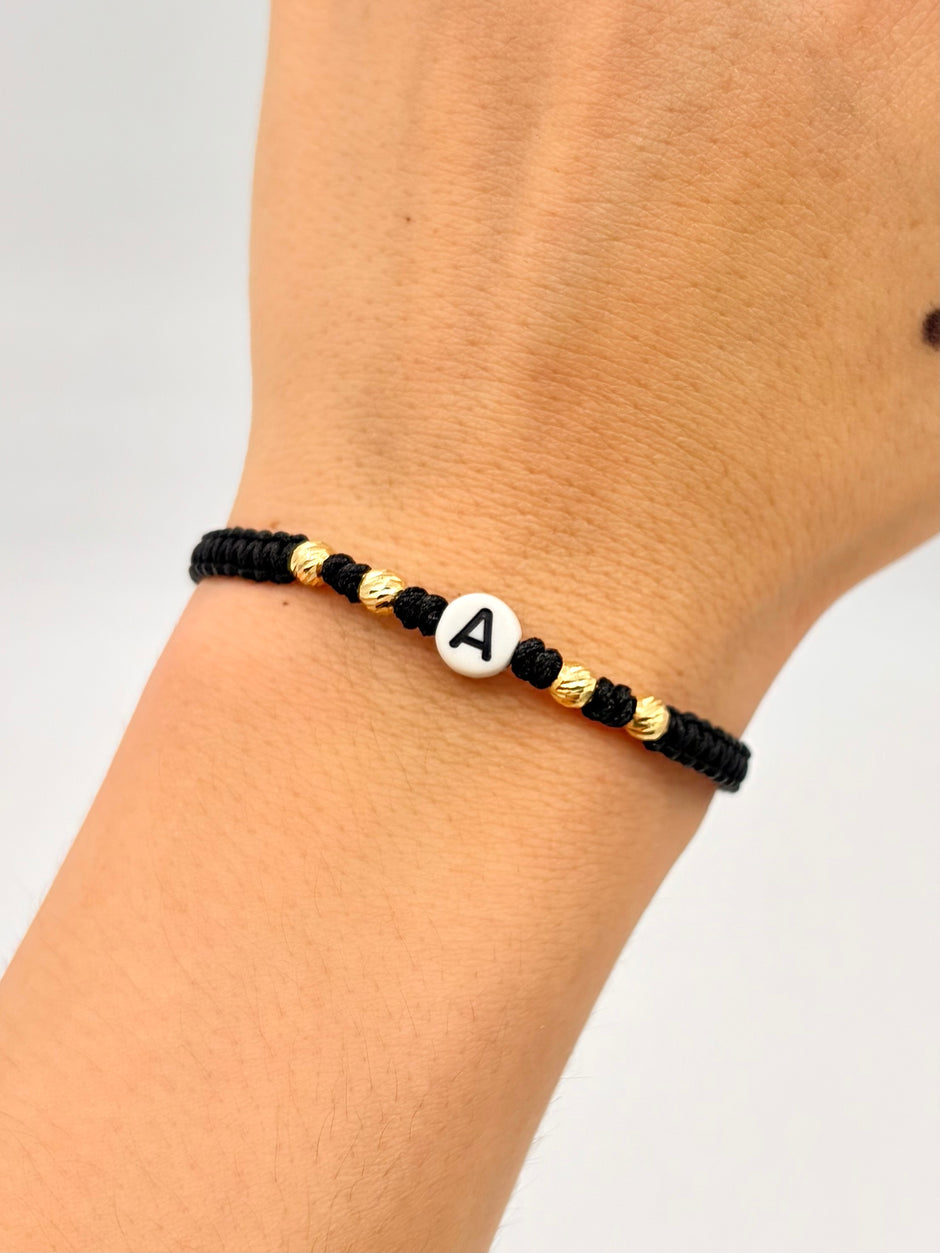 Pulsera tejida letra A 4BD #4 hilo negro Oro amarillo 18k 0,28 Gr