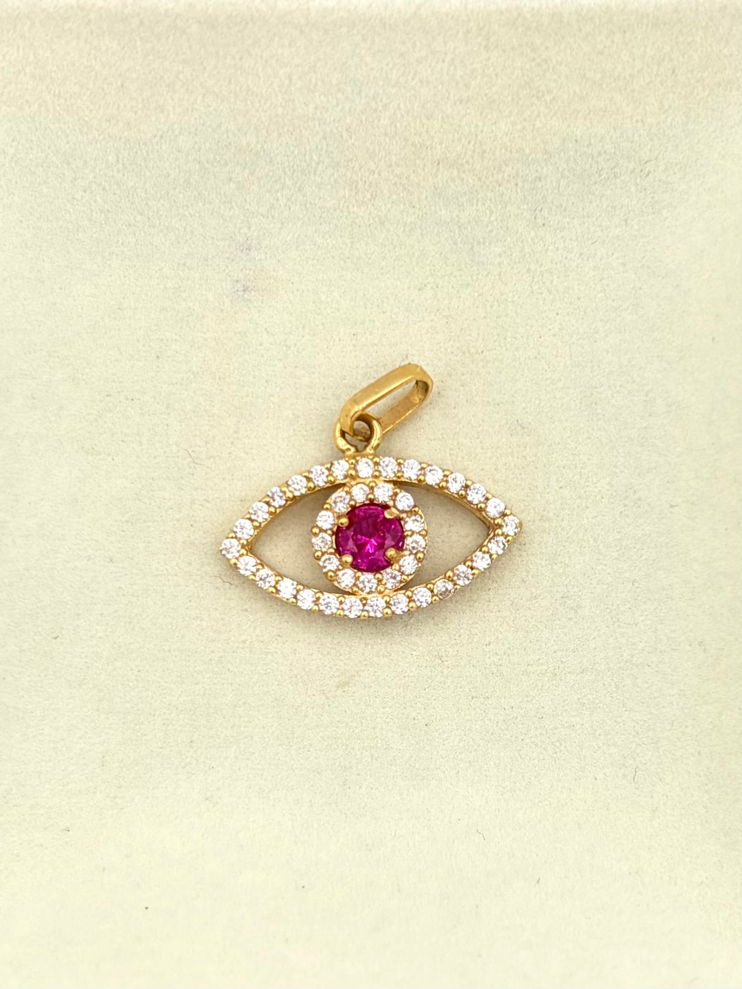 Dije Ojo circones  Oro amarillo 18k 1,77 Gr / 2 Cm