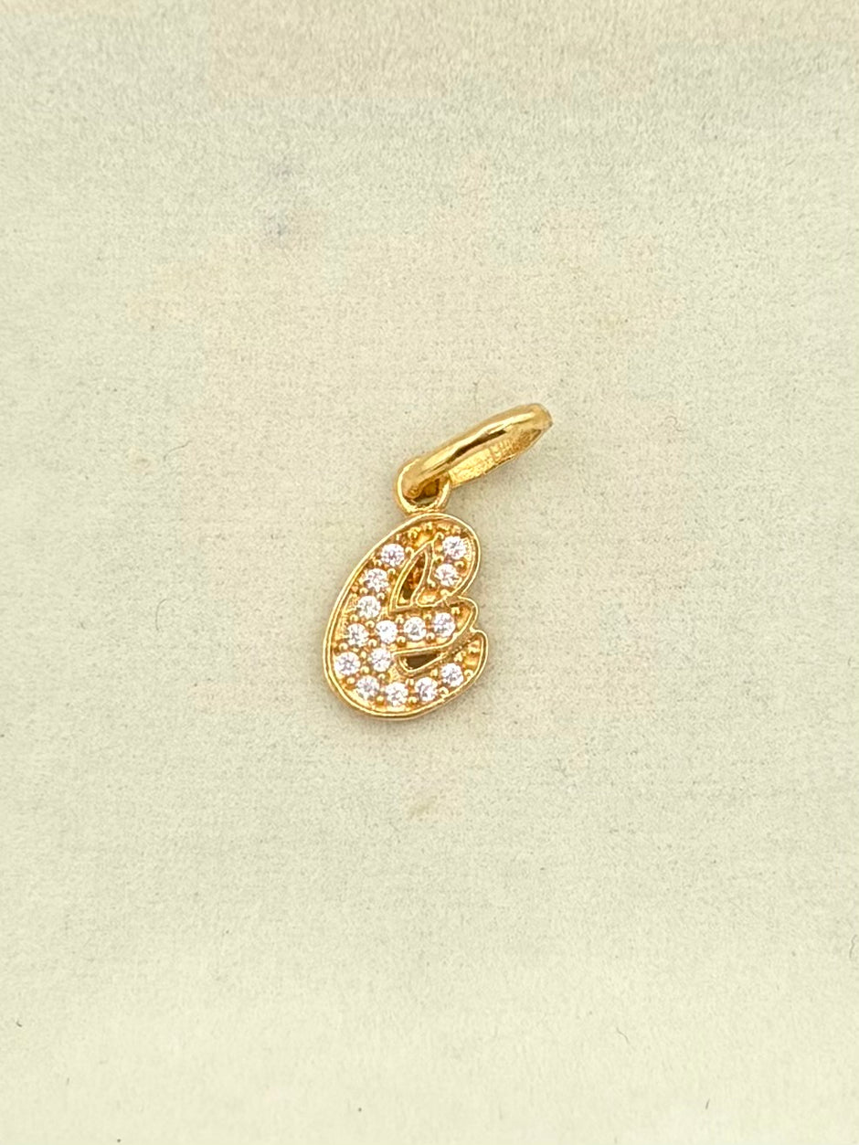 Dije Inicial E cursiva circones  Oro amarillo 18k 0,74 Gr / 0,7 mm