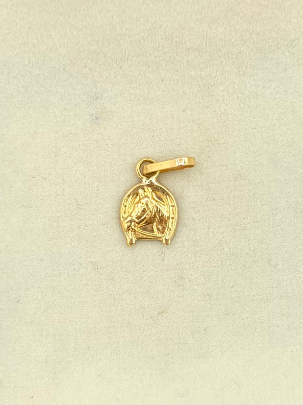 Dije Herradura de caballo  Oro amarillo 18k 0,34 Gr / 0,8 mm