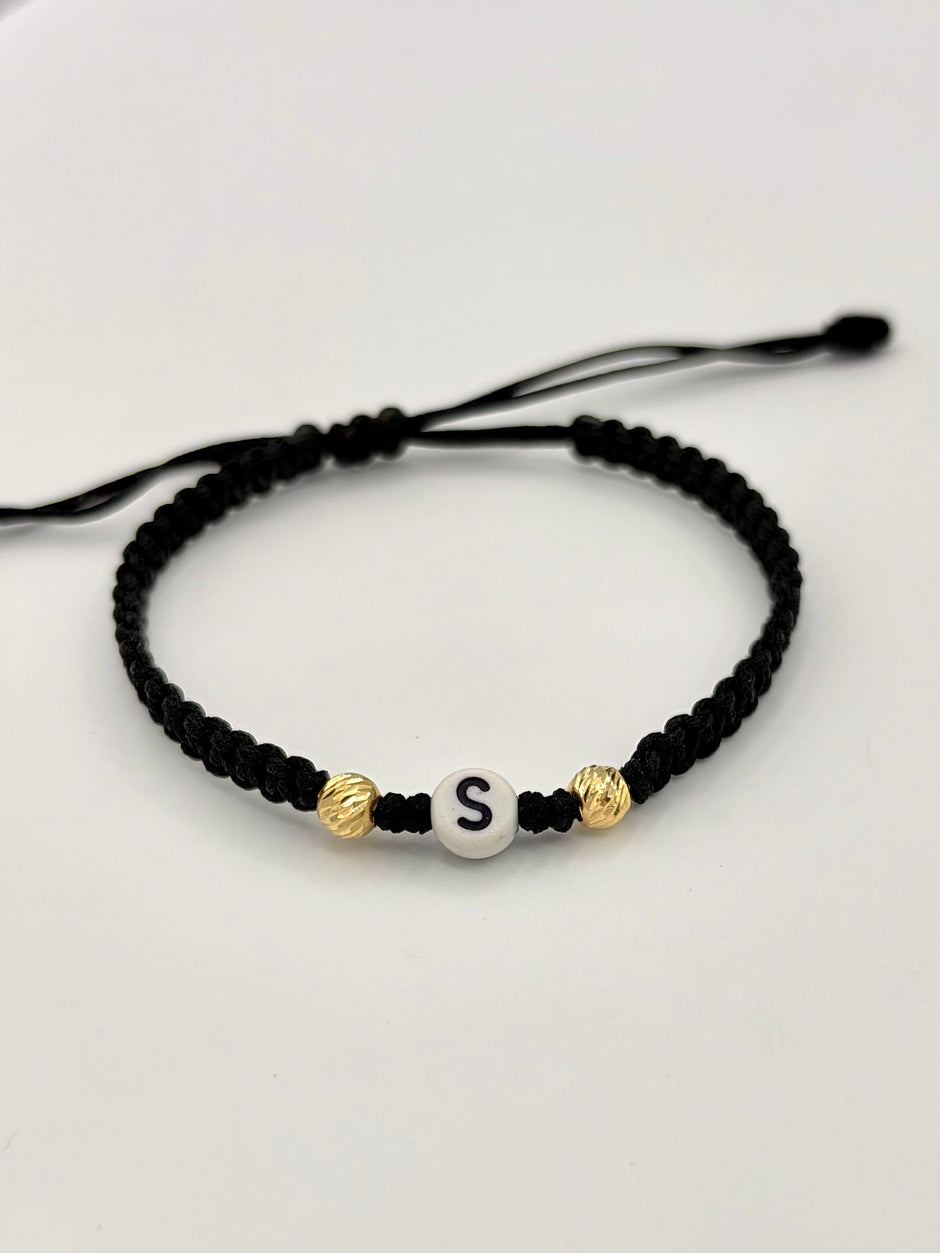 Pulsera tejida letra S 2BD #5 hilo negro Oro amarillo 18k 0,15 Gr