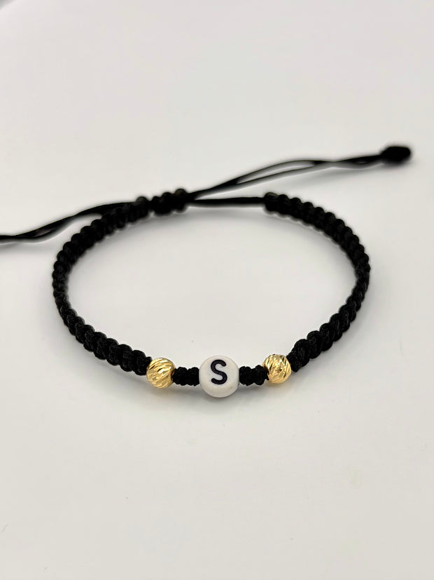 Pulsera tejida letra S 2BD #5 hilo negro Oro amarillo 18k 0,15 Gr