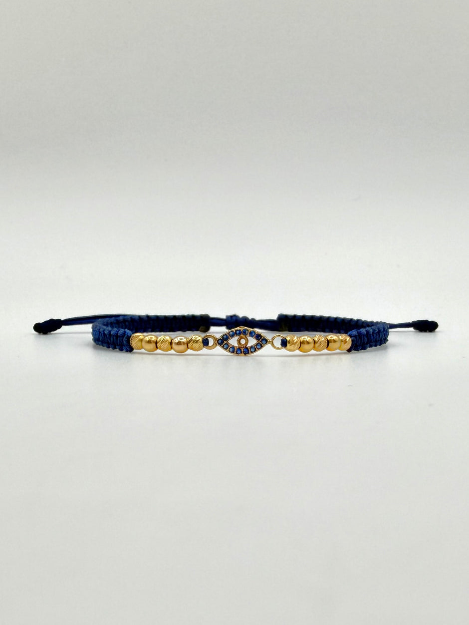 Pulsera tejida herraje ojo circones azules 6BD #3 4BL #3 hilo azul Oro amarillo 18k 1,60 Gr