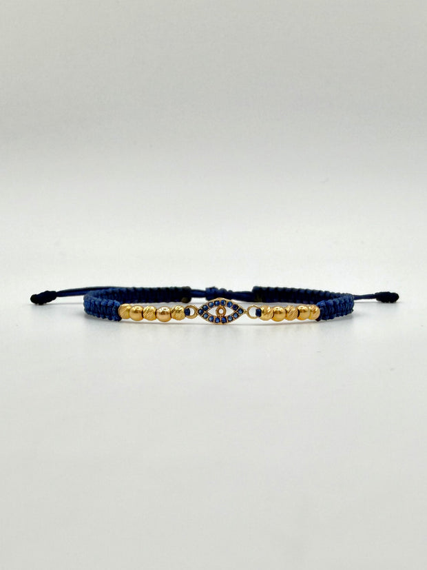 Pulsera tejida herraje ojo circones azules 6BD #3 4BL #3 hilo azul Oro amarillo 18k 1,60 Gr