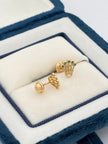 Topos corona circones verdes  Oro amarillo 18k 1,0 Gr / 7 mm