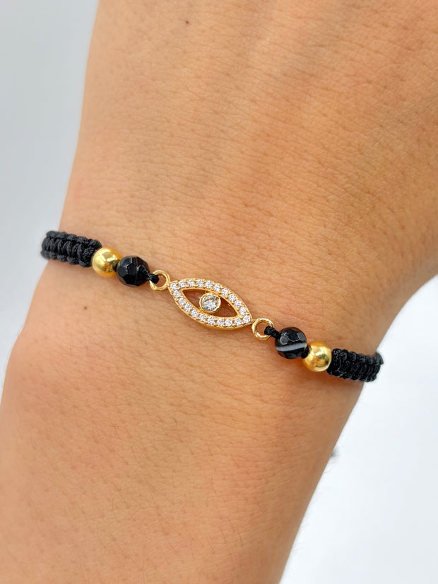 Pulsera tejida herraje ojo circones blancos 2BL #4 hilo negro Oro amarillo 18k 0,80 Gr