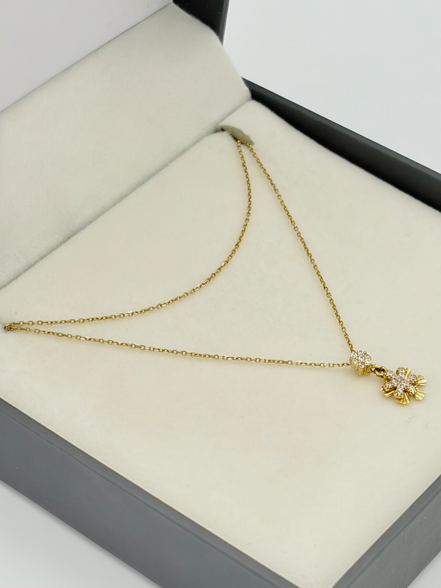 Cadena It Aro seguido con dije flor casnting Oro amarillo 18k 2,0 Gr / 0,55 mm / 50 Cm