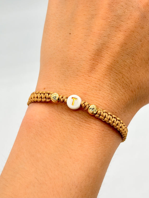 Pulsera tejida Letra T 2BD #5 hilo beige Oro amarillo 18k 0,15 Gr