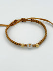 Pulsera tejida Letra T 2BD #5 hilo beige Oro amarillo 18k 0,15 Gr