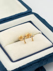 Topos cruz circon lila  Oro amarillo 18k 0,81 Gr / 6 mm